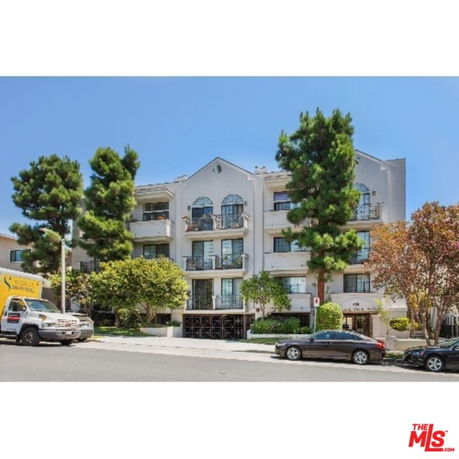 Front view of a multi-story residential building.