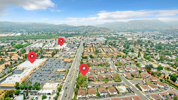 Panoramic view of a residential area with surrounding cityscape.