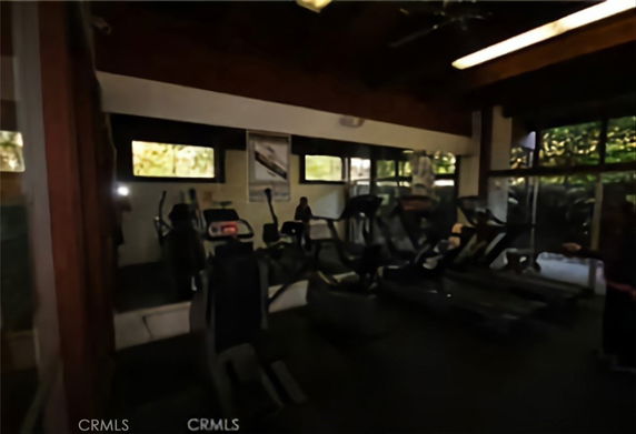 Indoor gym area with exercise equipment.