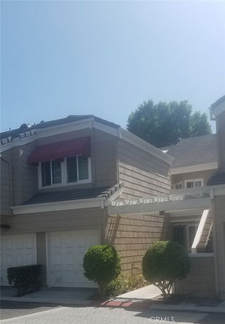 Front view of a two-story house with a double garage.
