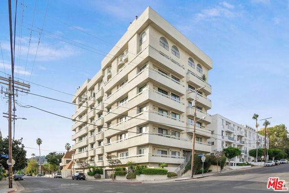 Front view of a multi-story apartment building.