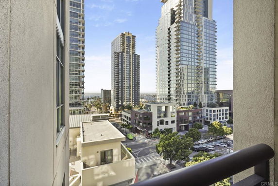 View from a building showing several high-rise towers and streets below.
