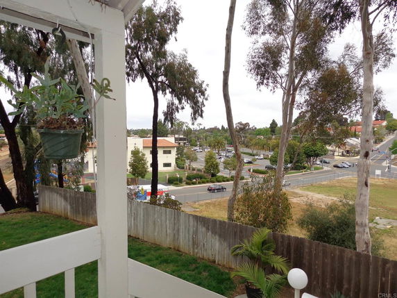 View from a building showing roads, trees, and surrounding areas.