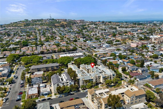 Panoramic view of residential area with multiple buildings and streets.