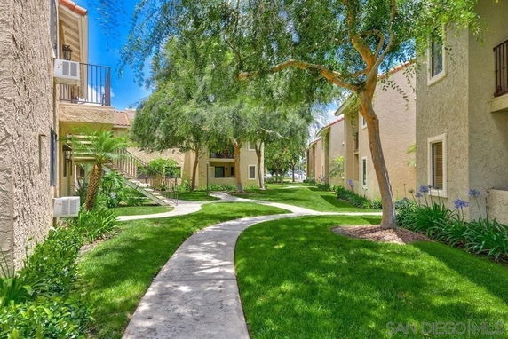 Garden area with buildings and pathways.