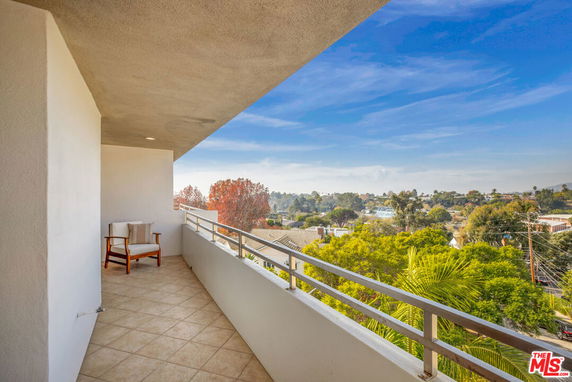 View from a balcony showcasing the surrounding landscape
