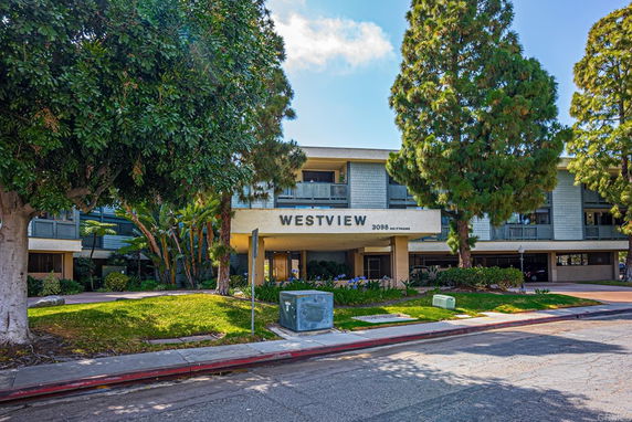 Front view of a multi-story building with a sign reading 'Westview'.