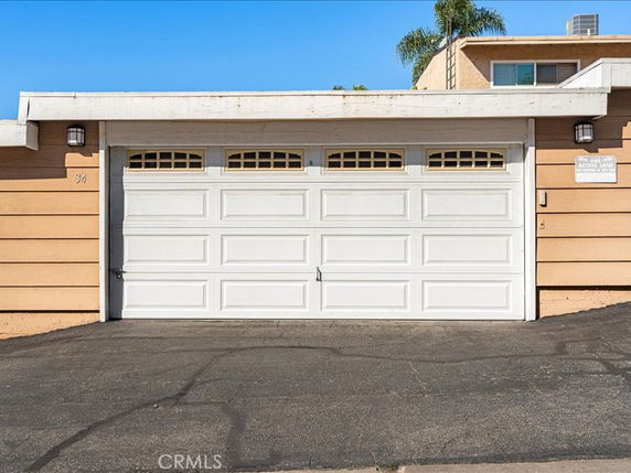 Front view of a garage door attached to a single-story building.
