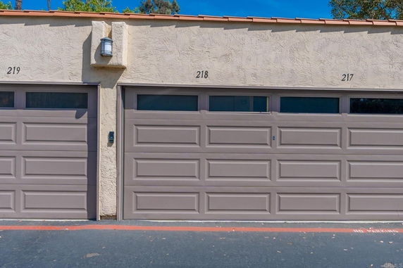 Front view of a set of garage doors in a residential building.