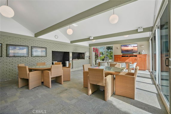 Indoor recreational area with seating and TV