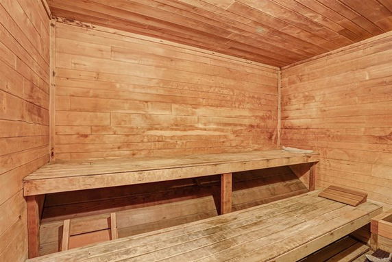 Interior view of a wooden sauna room.