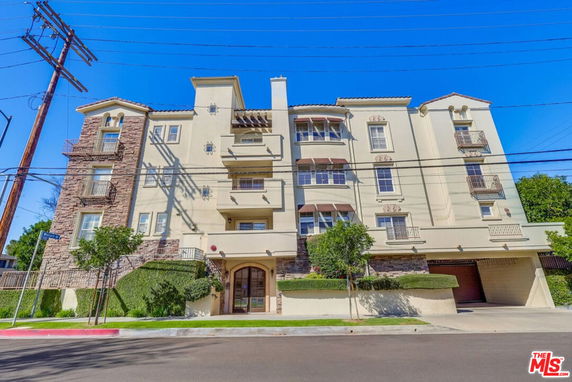 Front view of a multi-story residential building.
