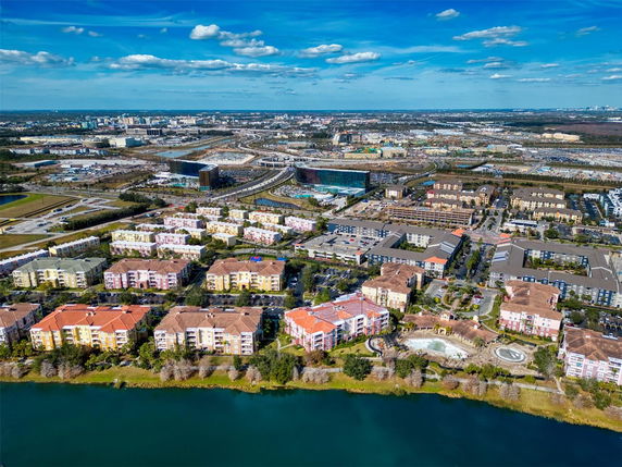 Panoramic view of a residential area with multiple buildings and surrounding areas.