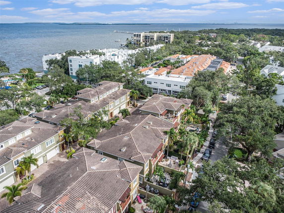 Panoramic view of residential buildings near a waterfront.