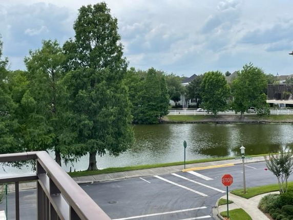 Panoramic view of trees and a water body from a building.