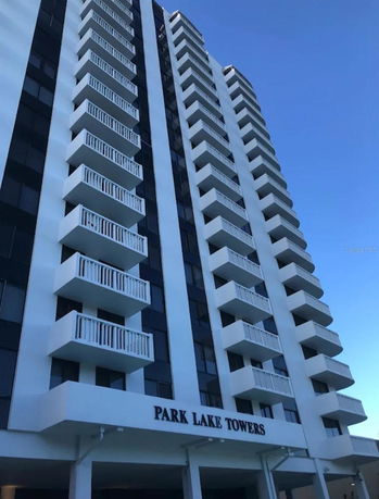 Front view of a high-rise apartment building named Park Lake Towers.