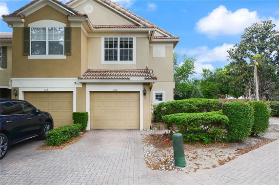 Front view of a two-story house with a double garage.