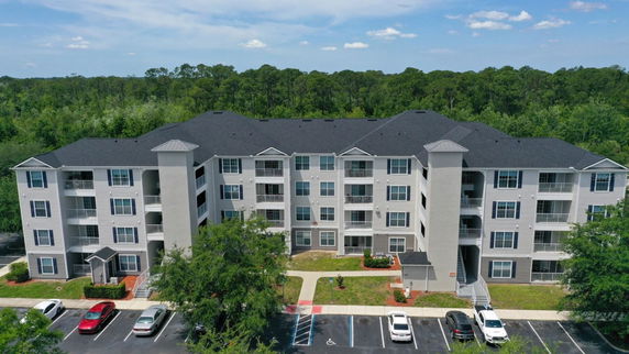 Front view of a multi-story apartment building.