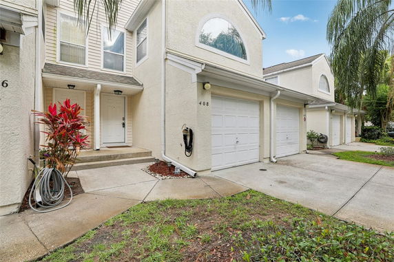 Front view of a two-story house with a double garage.