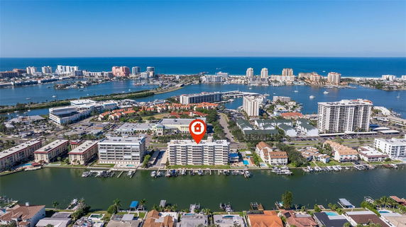 Panoramic view of a coastal area with multiple buildings and waterways.
