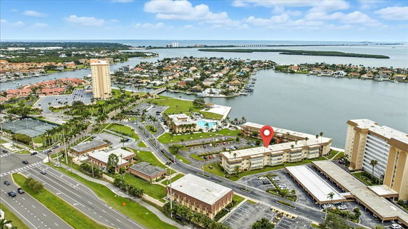 Panoramic view of a coastal area with multiple buildings and waterways.