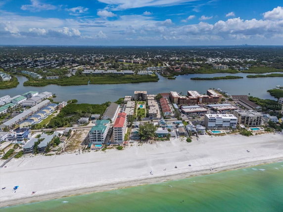 Panoramic view of beachfront buildings and surrounding area.