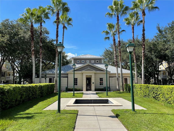 Front view of a single-story building with a metal roof.