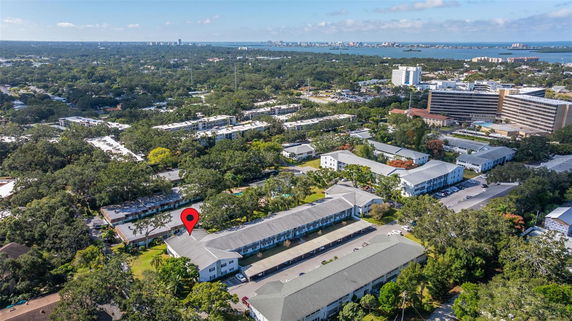 Panoramic view of residential area with apartment buildings and greenery.