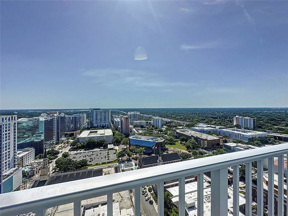 Panoramic view of a cityscape seen from a high vantage point.