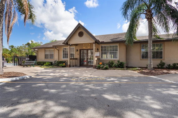 Front view of a single-story building with a gabled roof.
