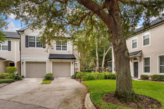 Front view of a two-story house with a double garage.