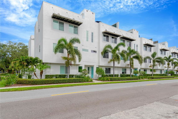 Front view of a multi-story building with a modern design.