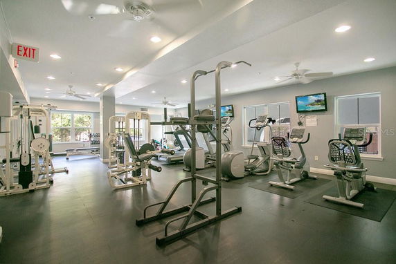 Interior view of a gym facility with various exercise machines.