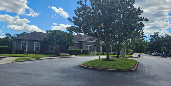 Front view of a single-story building with a pitched roof.