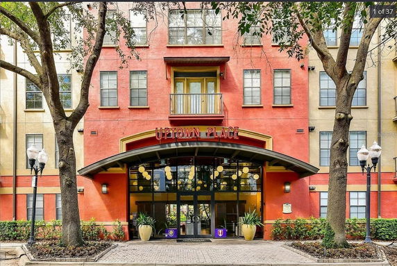 Front view of a multi-story building with a prominent entrance.
