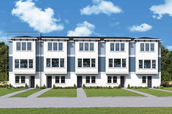 Front view of a three-story row of townhouses with blue and white exterior.