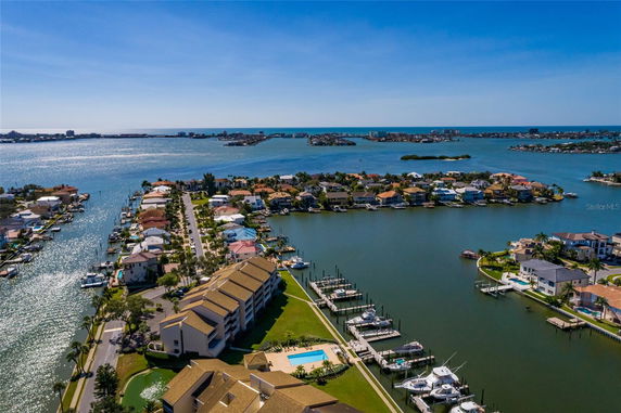 Panoramic view of waterfront residential area with canals and houses.