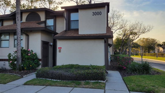 Front view of a two-story house with an address number 3000.