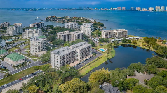 Panoramic view of coastal residential buildings and water bodies.
