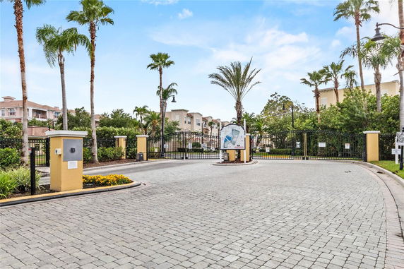 Front view of a gated residential community entrance.
