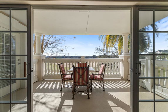 Balcony with outdoor furniture and a view of the surroundings.