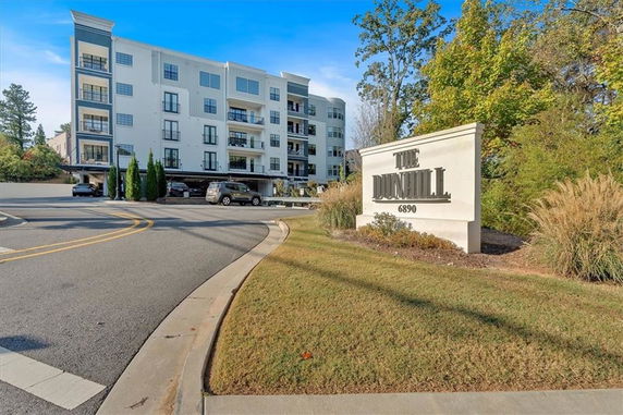 Front view of a multi-story residential building.
