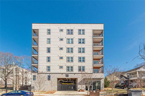 Front view of a multi-story apartment building.