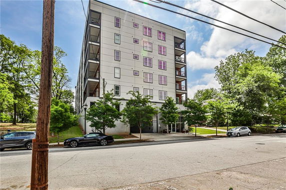 Front view of a multi-story apartment building.