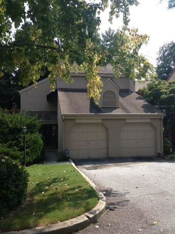 Front view of a house with a double garage.