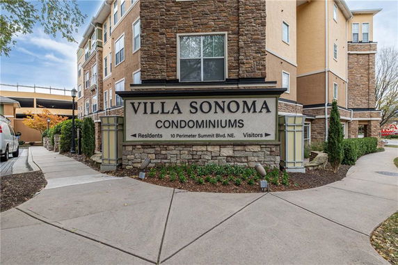 Front view of a condominium building labeled Villa Sonoma.