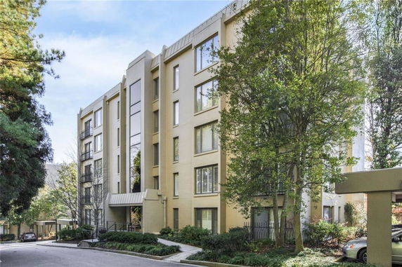 Front view of a multi-story residential building.