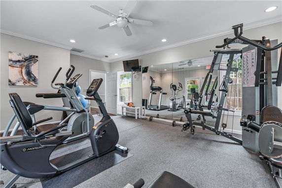 Indoor gym area with exercise equipment and mirrors.