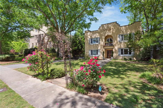 Front view of a two-story house with a symmetrical facade.