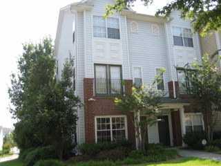 Front view of a multi-story residential building.